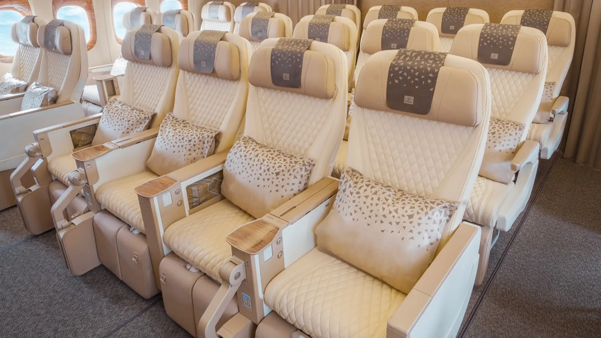 how is business class different to premium economy